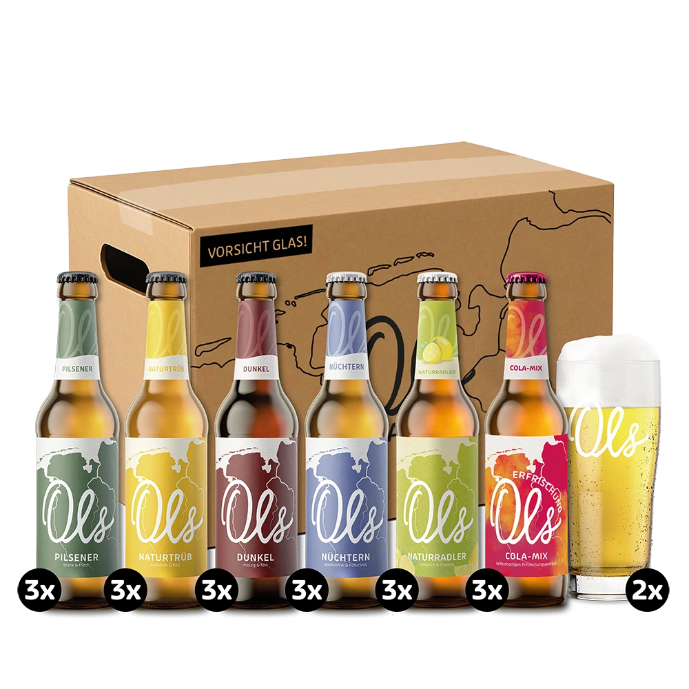 Ols Probierbox mit Cola Mix und Glas Viel Verschiedene Ols Flaschen Und Ein Glas Vor Einer Versandbox